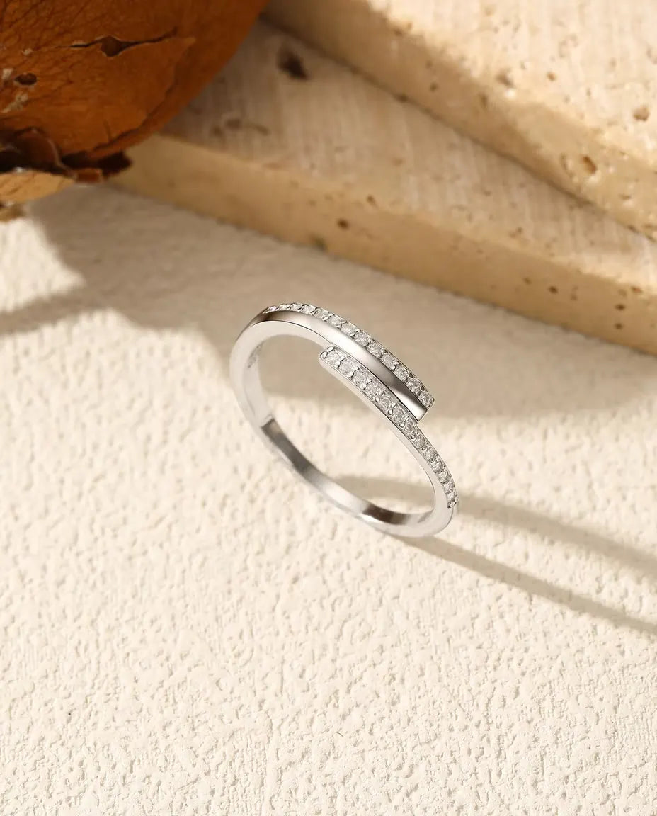 Crossover Pave Moissanite Ring - Twenty-Six D Colour Stones on a 1.4 mm Band, 925 Sterling Silver, Sizes 5-9