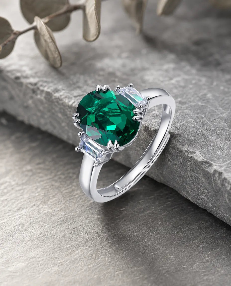 Lab emerald oval three stone adjustable ring in sterling silver with baguette CZ sides