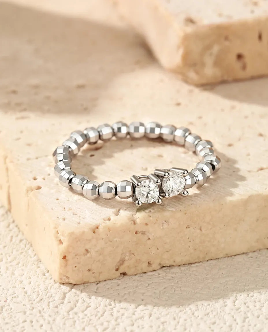 Adjustable beaded moissanite ring in 925 sterling silver with two round D colour stones
