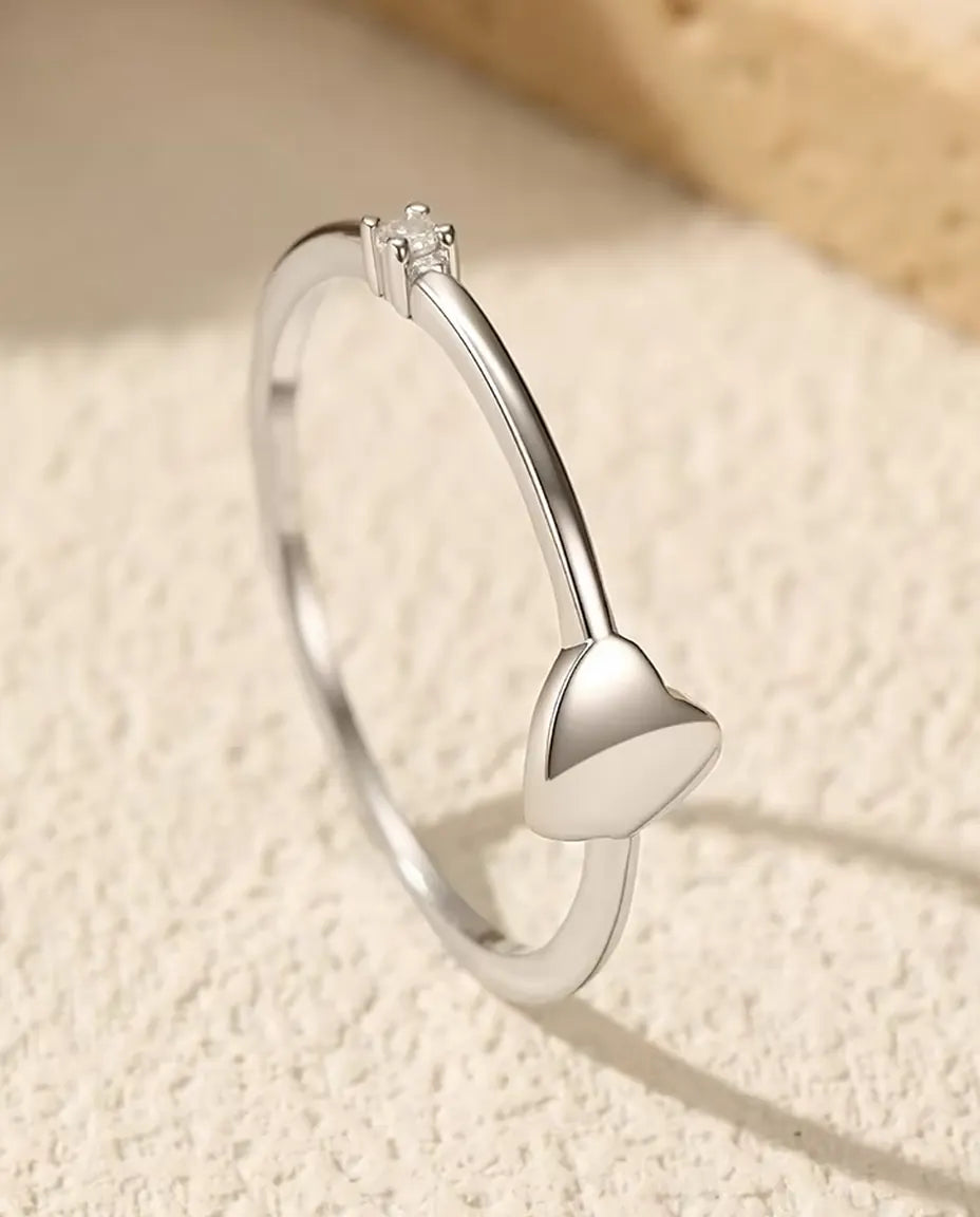 Tiny Heart Ring - 5 mm Polished Heart with a D Colour Moissanite Accent on a 0.8 mm 925 Sterling Silver Band, Sizes 5 to 9