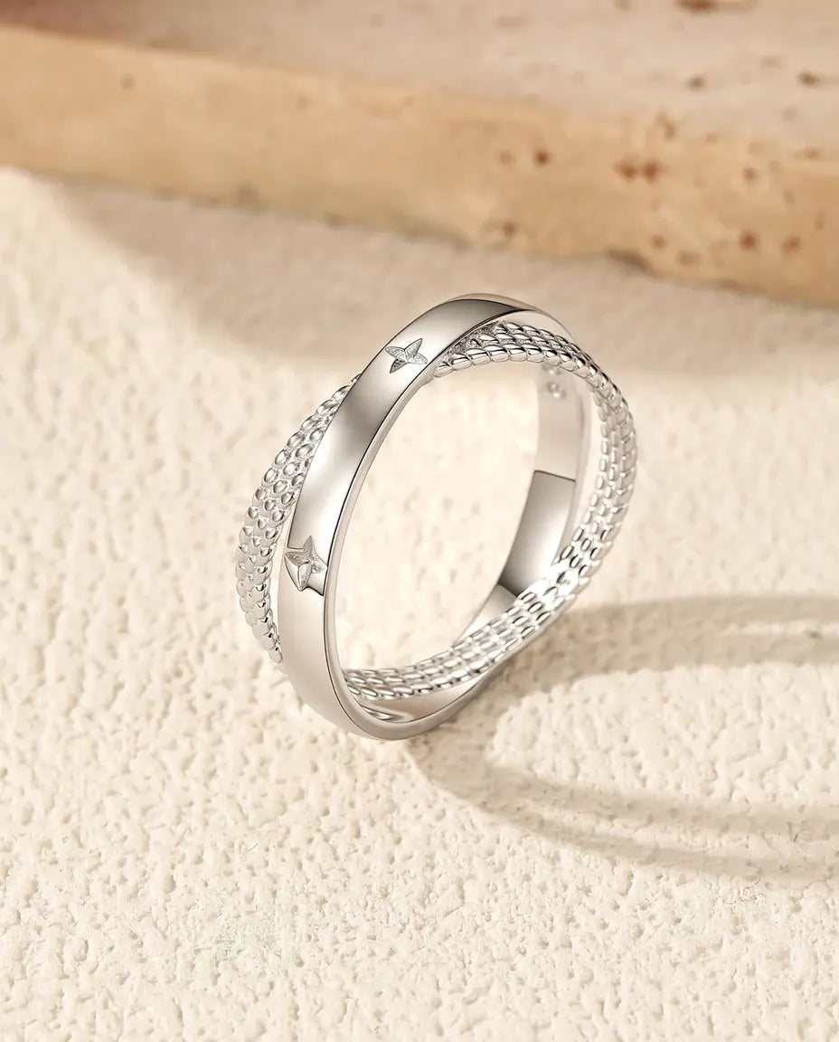 X shape criss cross ring with pave stars in 925 sterling silver